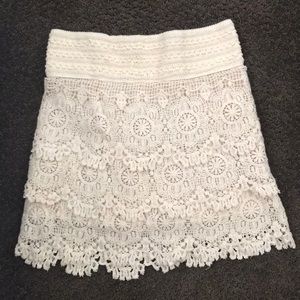 Cream, lace, skirt.